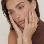 Petal wrap sculpture ring side view