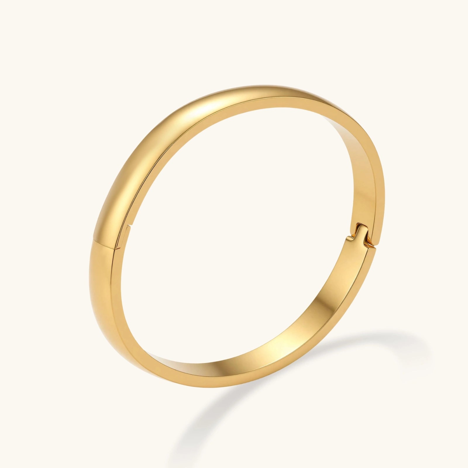 Polished gold-tone bangle close-up