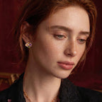 Gold-tone wildflower studs shown as a pair
