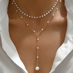 Twin pearl necklace close-up