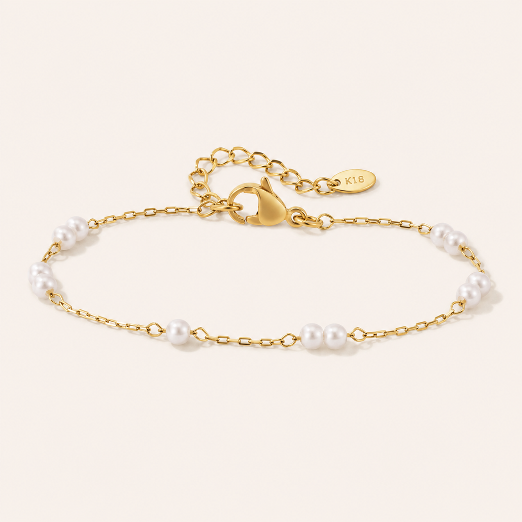 Pearl bracelet on white background