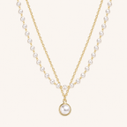 Layered pearl clavicle necklace close-up