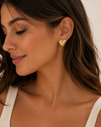 Heart earrings shown on model