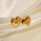 Heart studs on white background