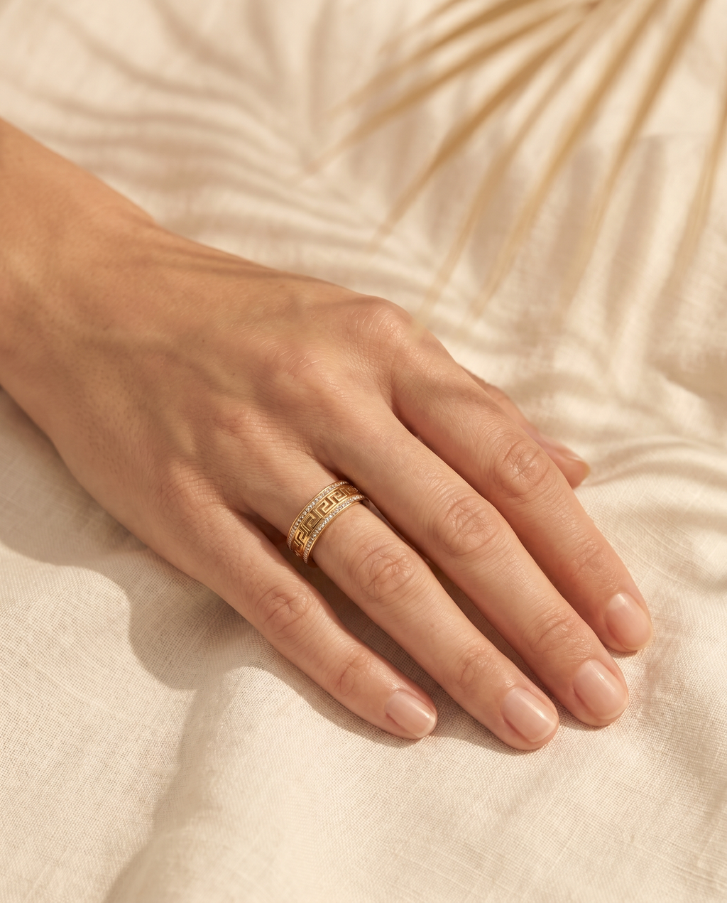 Celestial Band Ring shown on model in warm light