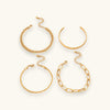 Chunky gold-tone chain bracelet set shown together