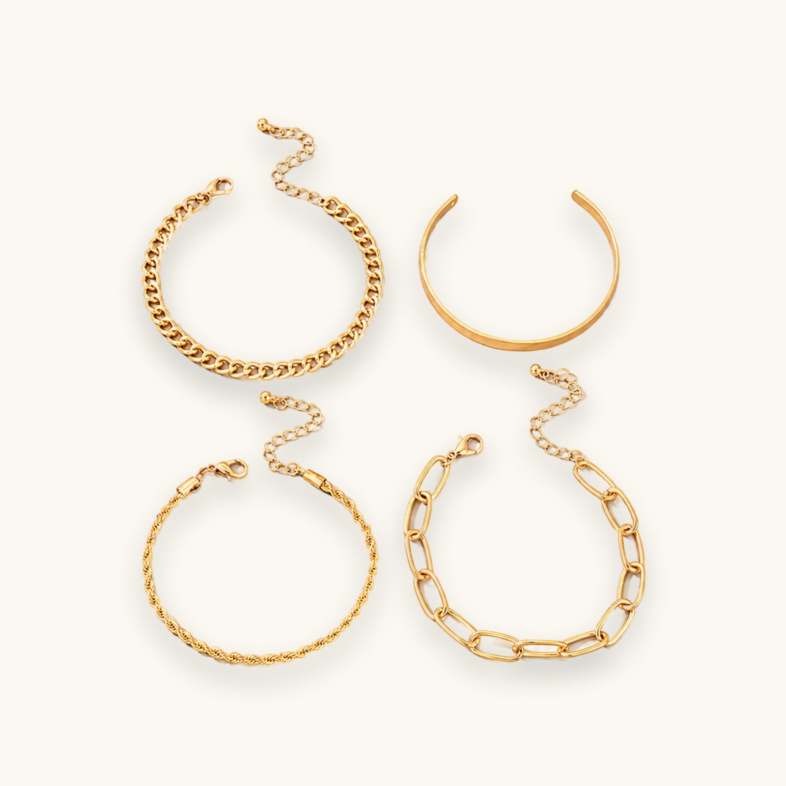 Chunky gold-tone chain bracelet set shown together