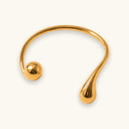 Gold-tone water drop twist cuff bracelet